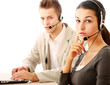 Attractive young people working in a call center