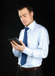 Photo: Handsome businessman using computer plane-table Handsome businessman using computer plane-table