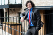 Photo: Smart male professional posing casually, outdoors Smart male professional posing casually, outdoors