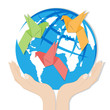 Earth in hands. Origami paper bird on globe.