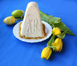 Traditional Russian curd easter pie on a blue background