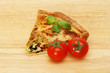 Slice of quiche on a board