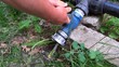 person opening a valve