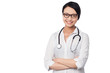 Young pretty female doctor with arms folded