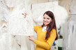 Photo: woman chooses wedding dress woman chooses wedding dress