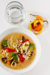 Bowl of soup on a white backgroud