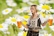 summer party with sexy tiroler oktoberfest woman holding a beer