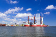 Photo: Shipyard in Gdynia with wind turbine installation vessel, Poland Shipyard in Gdynia with wind turbine installation vessel, Poland