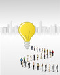 Vettoriale: a crowd of business people standing in a line to reach a idea a crowd of business people standing in a line to reach a idea