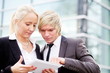 Photo: business woman man digital tablet business woman man digital tablet