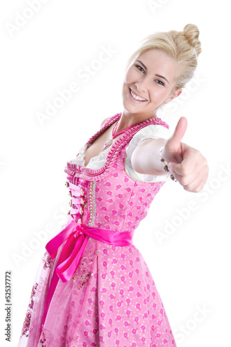Photo: Hübsches blondes junges Mädchen isoliert im Trachtenkleid Hübsches blondes junges Mädchen isoliert im Trachtenkleid