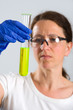 woman in laboratory with test tube