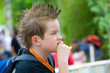 Photo: boy with stylish hair is reflecting boy with stylish hair is reflecting