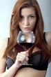 canvas print picture - beautiful young woman enjoying wine