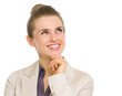 Happy business woman looking on copy space