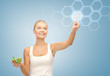 woman with salad and virtual screen