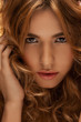 Photo: woman with long curly hair woman with long curly hair