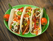Beef taco on the plate with vegetables