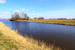 Countryside landscape with grassland and canal
