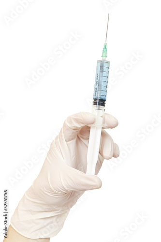 Photo: syringe in hand syringe in hand