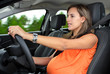 Photo: Pregnant Woman Driving a Car Pregnant Woman Driving a Car