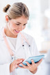 Doctor using a tablet computer