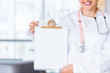 Doctor showing a clipboard