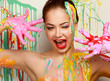 Photo: Beautiful woman painted with many vivid colors. Beautiful woman painted with many vivid colors.