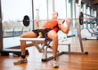 Photo: Man lifting a yoke Man lifting a yoke