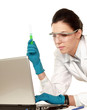 Foto: A scientific researcher or doctor looking at a test tube A scientific researcher or doctor looking at a test tube