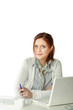 A young woman sitting at her workplace