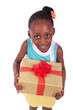 Young African American little girl holding a gift box
