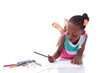 Foto: Cute black african american little girl drawing - African people Cute black african american little girl drawing - African people