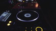 Dj is playing the set at his deck