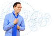 Young business man binding his blue tie
