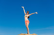 Photo: Portrait of young woman in bikini at beach Portrait of young woman in bikini at beach