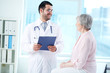 Photo: Interacting with patient Interacting with patient