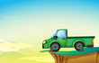 A green cargo truck at the cliff
