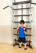 The little boy strengthens muscles of hands