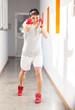 Photo: Boxer with red gloves in a gym Boxer with red gloves in a gym