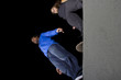 free runner getting ready to do parkour at night