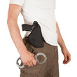 Close-up of a man with a gun and handcuffs