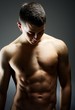 Young sexy muscular man posing