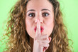 Beautiful Young Woman asking for Silence