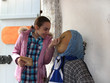 A girl and a rag doll toy