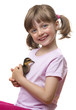 little girl holding a duckling