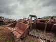 rusty tractor buckets