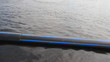 pipe laid in the river along the coast