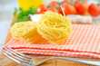 raw pasta and tomato