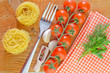 raw pasta and tomato